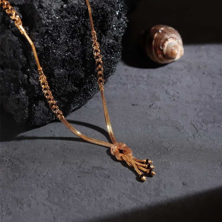 Damini Shimmery Ballerina Knot Drops Gold Mangalsutra